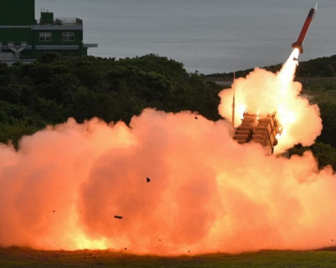 Taiwan shows off missile firepower on rare trip to sensitive test site