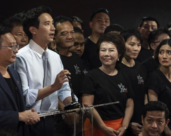 Thai court bans popular politician, dissolves reformist party