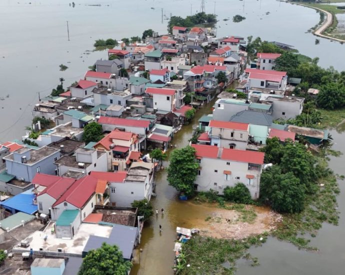 Thousands of children cut off from school by north Vietnam floods