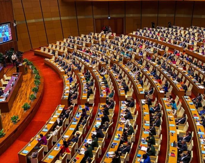 Vietnam replaces more top figures, to elect new president in October