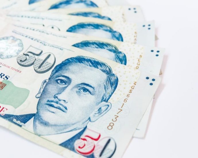 Jail for 5 Gurkha officers involved in unlicensed cross-border money transfers; 1 handled nearly S.9 million