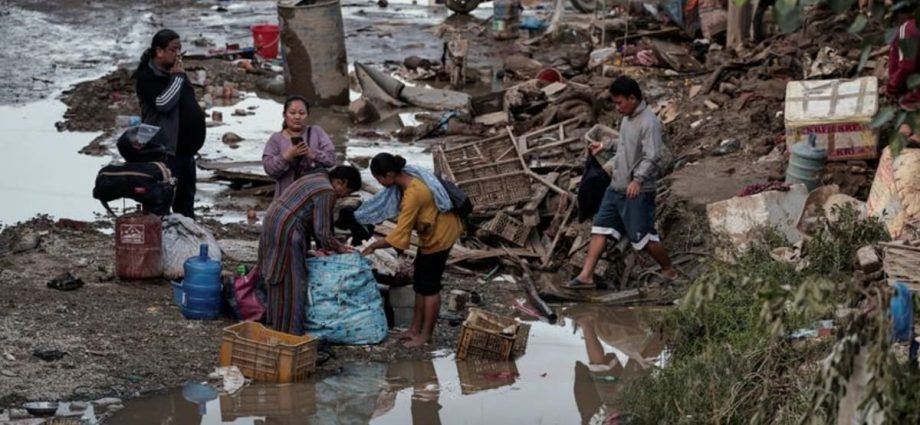 Nepal surveys flood wreckage as death toll reaches 209