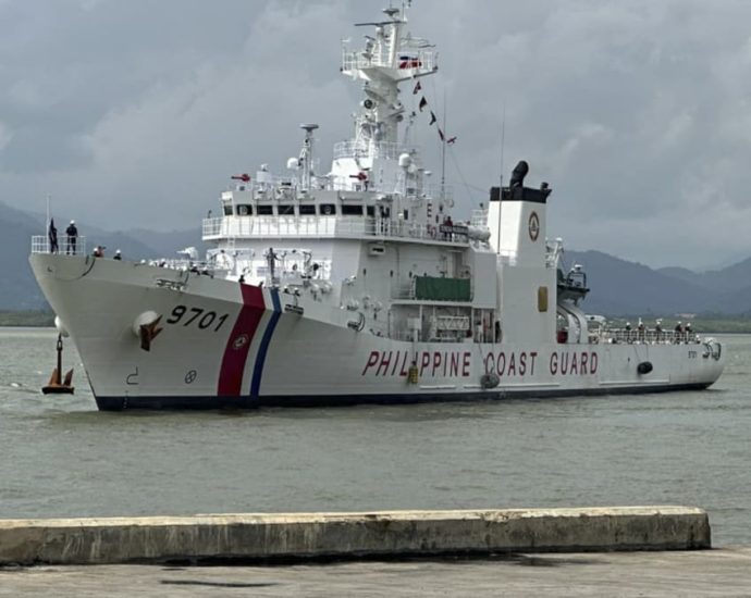 Philippines says disputed reef ‘not lost’ to China despite pullout