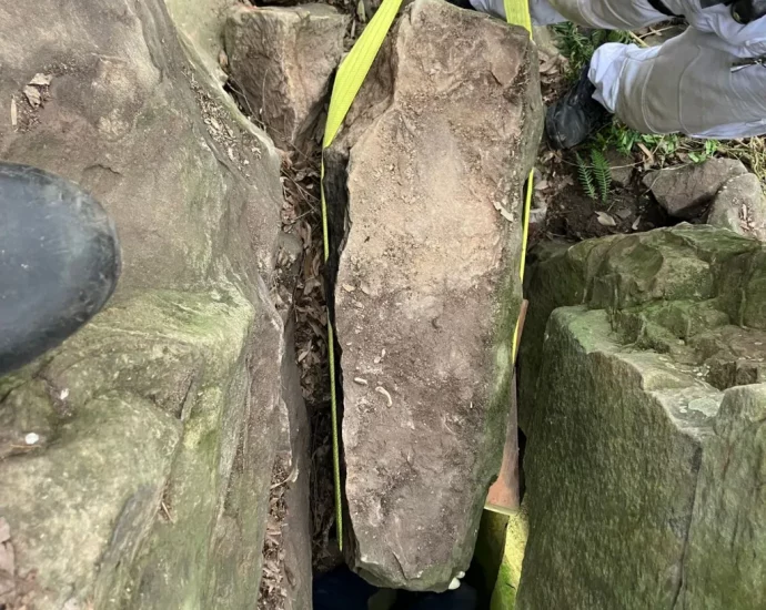 Australia woman rescued after getting stuck upside down between boulders