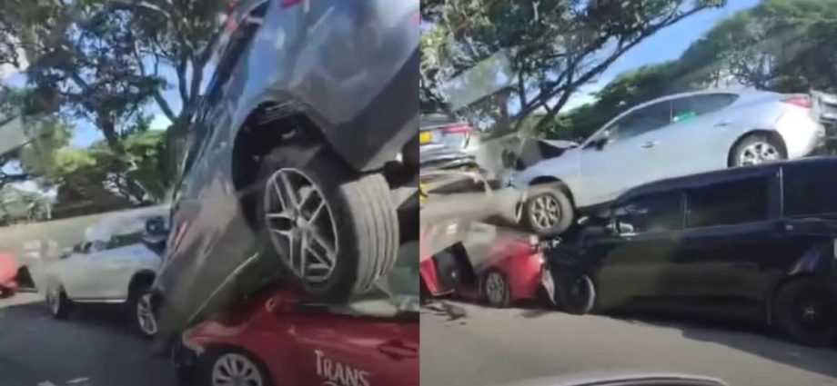 Cars stacked on top of each other after mass pile-up along ECP