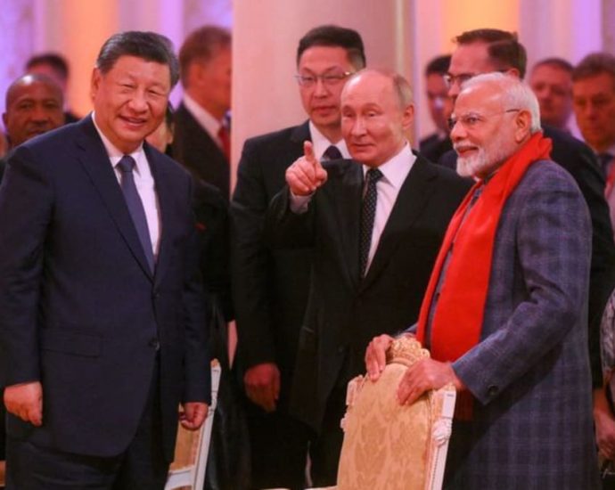 China and India should boost communication, manage differences, Xi tells Modi