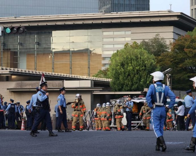 Man arrested after throwing apparent Molotov cocktails at Japan’s ruling party headquarters