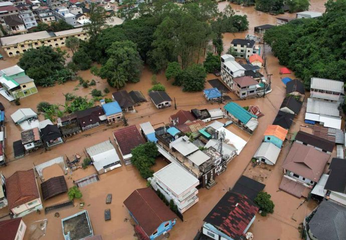 Sifting through Northern Thailand’s mud and floods