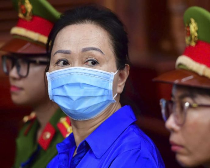 Vietnam death row tycoon faces verdict in new trial