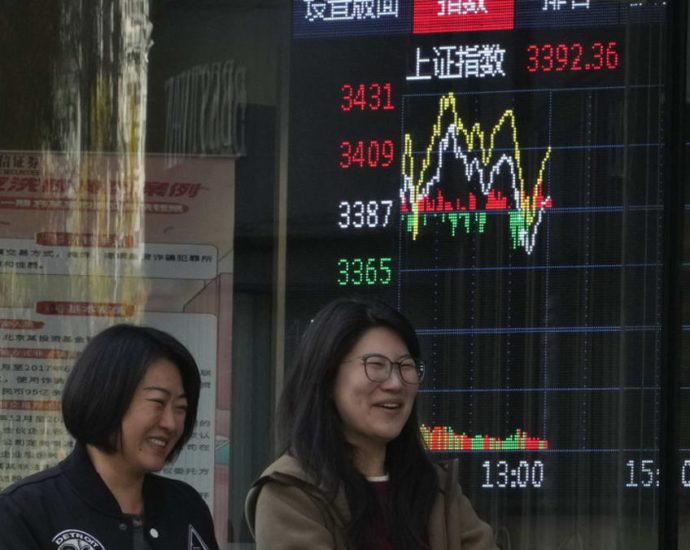 Asian markets extend rally after Fed cut