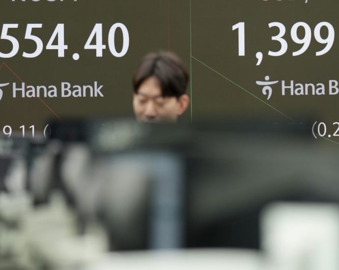 Asian shares retreat after Trump’s victory as focus turns to the Fed