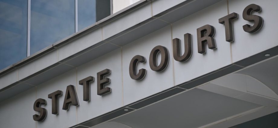 Jail for nurse aide who cheated elderly colleagues of about S,000 to pay off debts