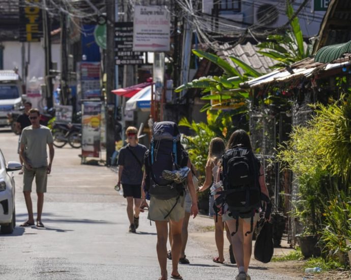 Laos government ‘profoundly saddened’ by tourist deaths from suspected methanol poisoning