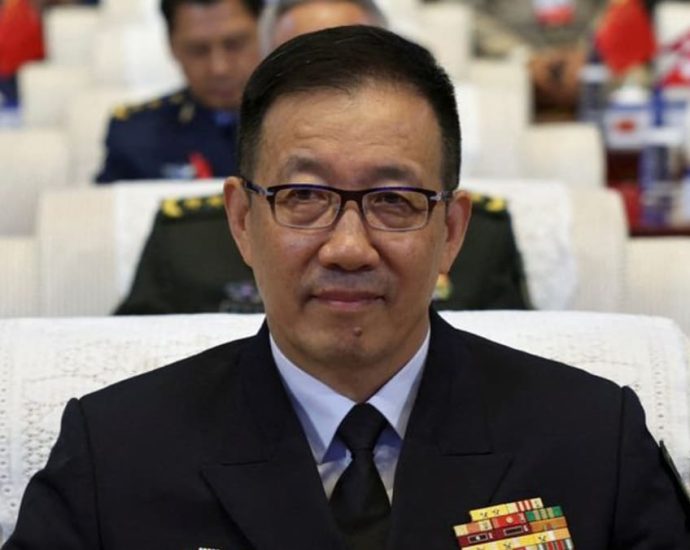 Chinese Defence Minister Dong Jun at public meeting a week after report of graft investigation