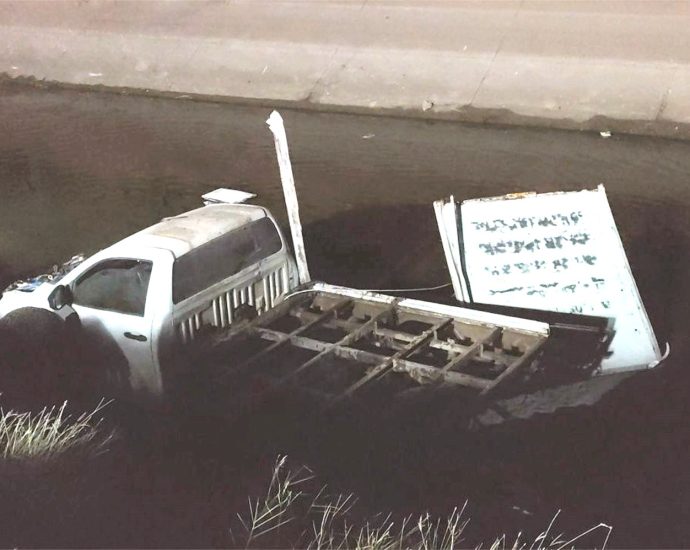 Delivery truck falls apart, plunges into canal