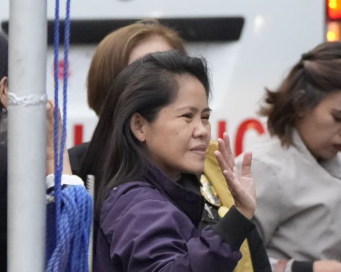 Filipina death-row prisoner in Indonesia arrives home in Philippines