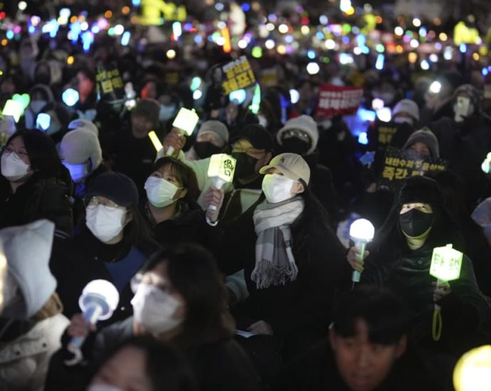 K-pop, carols, free food at South Korea impeachment protests