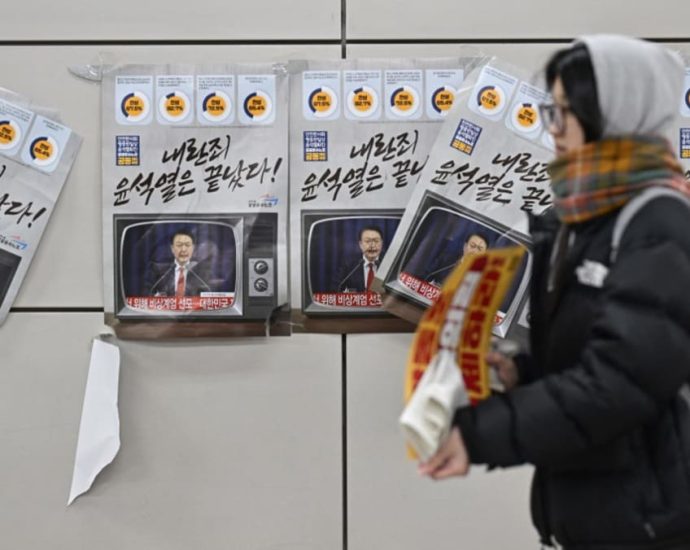 South Korea slaps travel bans on more top officials