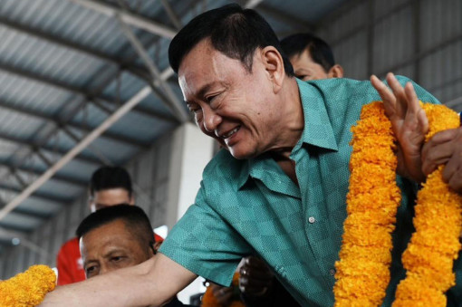 Thaksin urges coalition unity