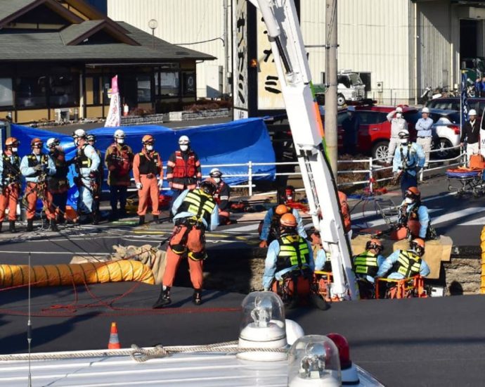 6m-deep sinkhole swallows truck in Japan, trapping driver