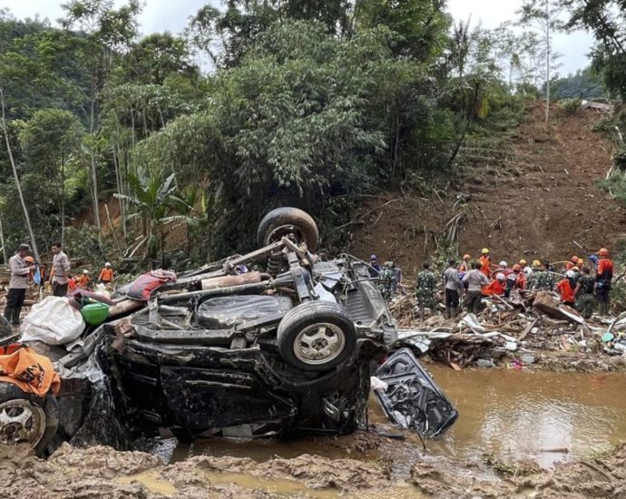 Indonesia landslide death toll rises to 22 as search paused