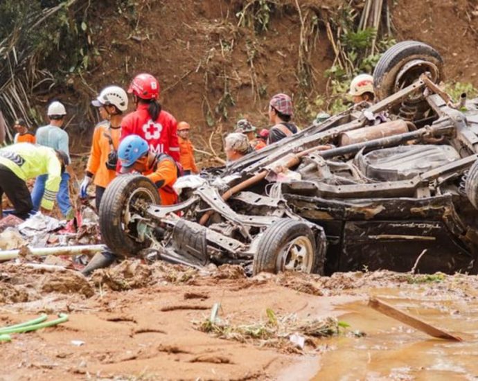 Indonesian rescuers halt evacuation due to bad weather after landslide kills 25