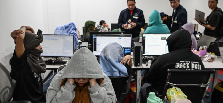 Philippines arrests 100 suspects in online scam farm raid