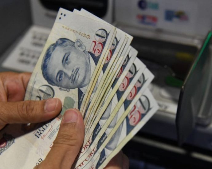 Singdollar to weaken with further MAS easing but economists rule out sharp decline