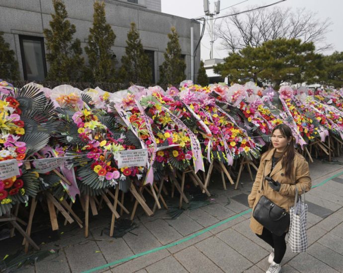 South Koreans turn funeral wreaths and K-pop light sticks into political protest tools