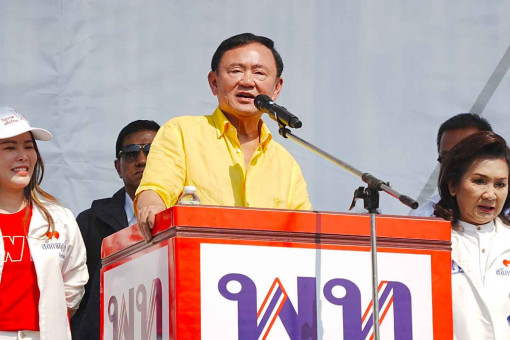 Thaksin dedicates himself to fixing the economy