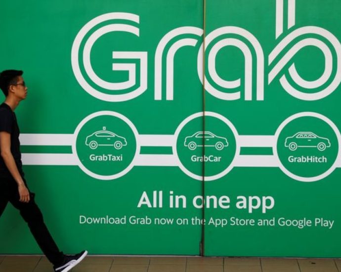 Grab and GoTo in advanced merger talks, sources say