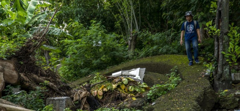 Pizza delivery leads to discovery of 320-year-old tombstone and this Indonesian’s bid to help others find ancestors