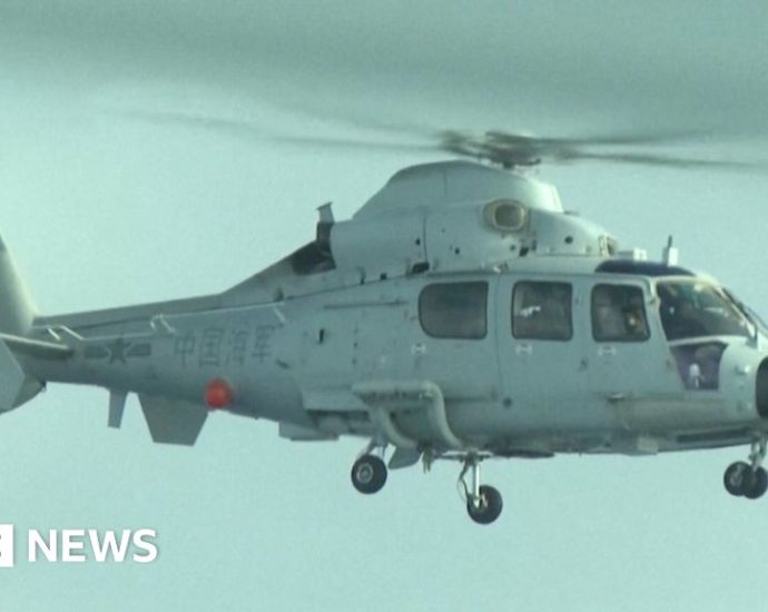 South China Sea: Chinese navy helicopter flies close to Philippine plane