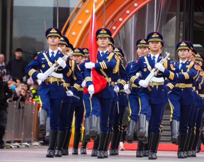 Young patriotic ex-soldiers bring Tiananmen flag ceremony to schools, social media