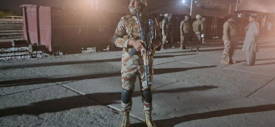 Pakistan insurgents take dozens of hostages in attack on train, police say