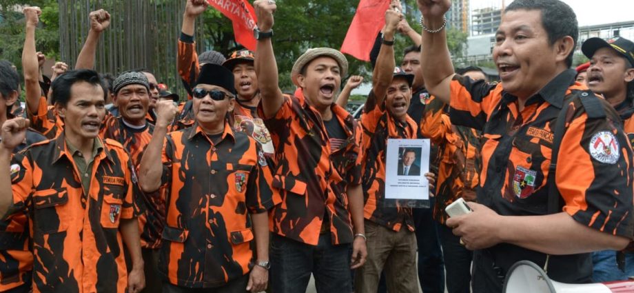 Calls grow in Indonesia for tougher action against civic group ‘thugs’ who extort firms, disrupt business