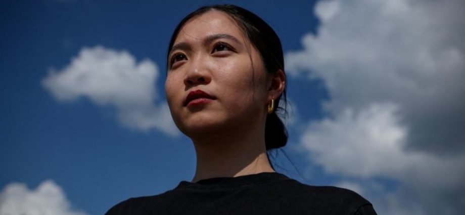 Hong Kong police arrest father and brother of wanted activist Anna Kwok