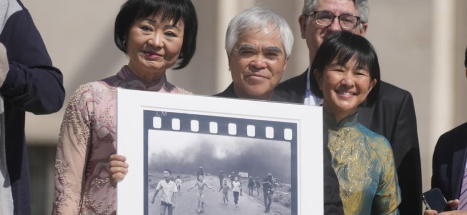 Photo group says it has ‘suspended attribution’ of historic Vietnam picture because of doubts