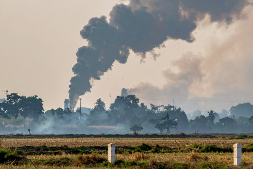 Residents use electric fans in protest against charcoal plant fumes
